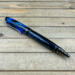 Black and blue resin cigar style ballpoint pen